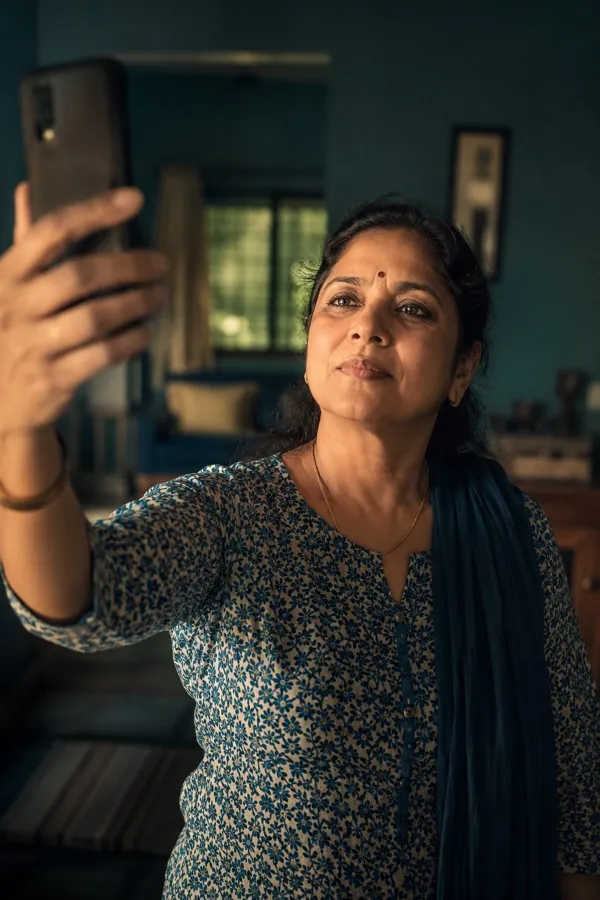 Holding a phone at arm's length to read